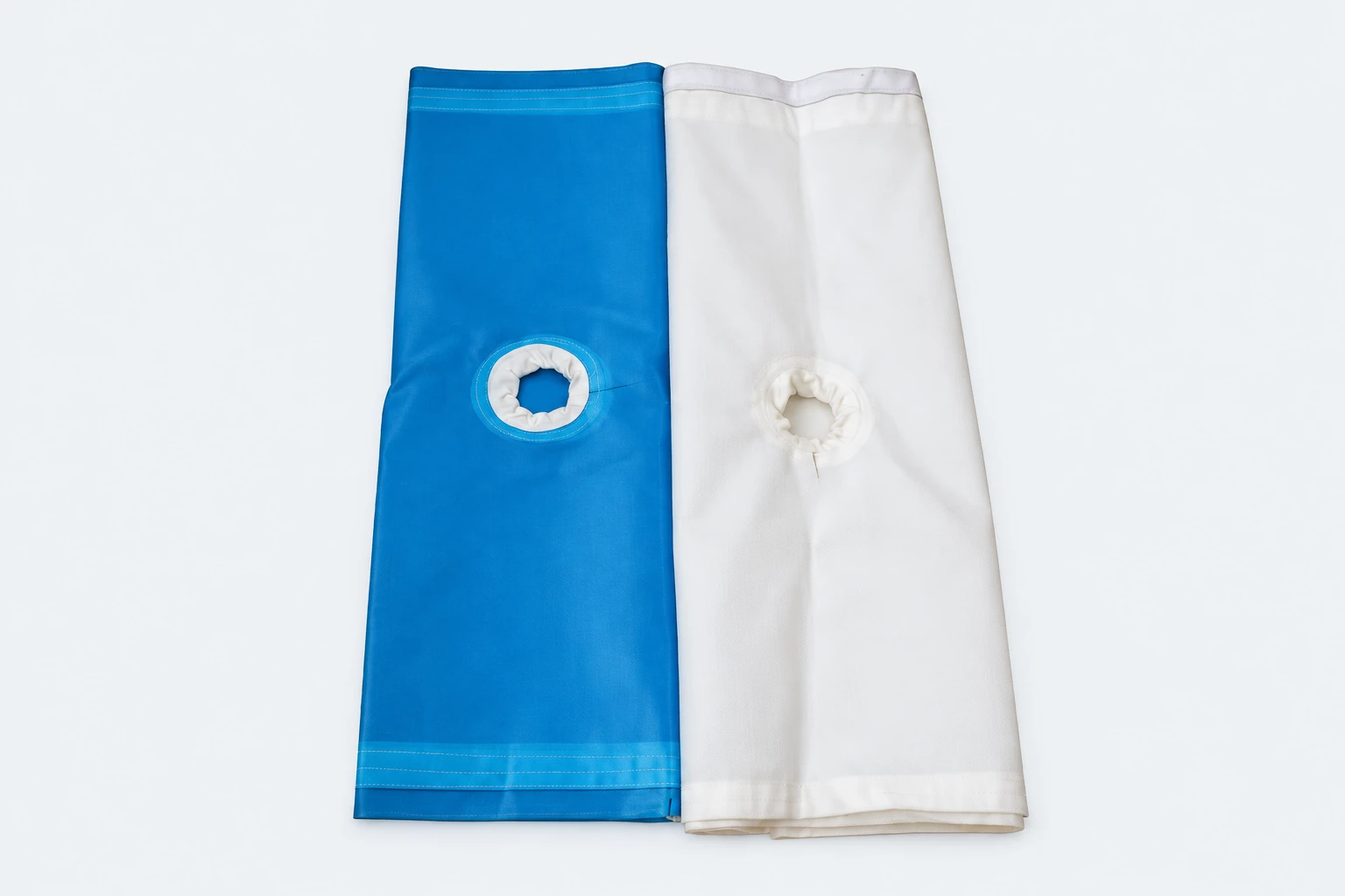 Pair of filter press cloths with central feed openings